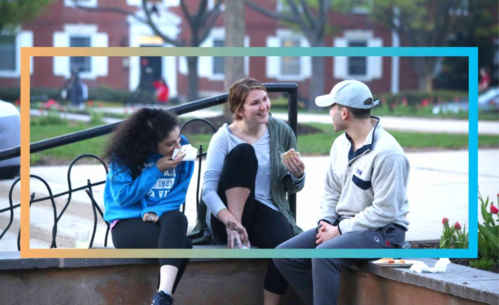 Students talking to each other outside